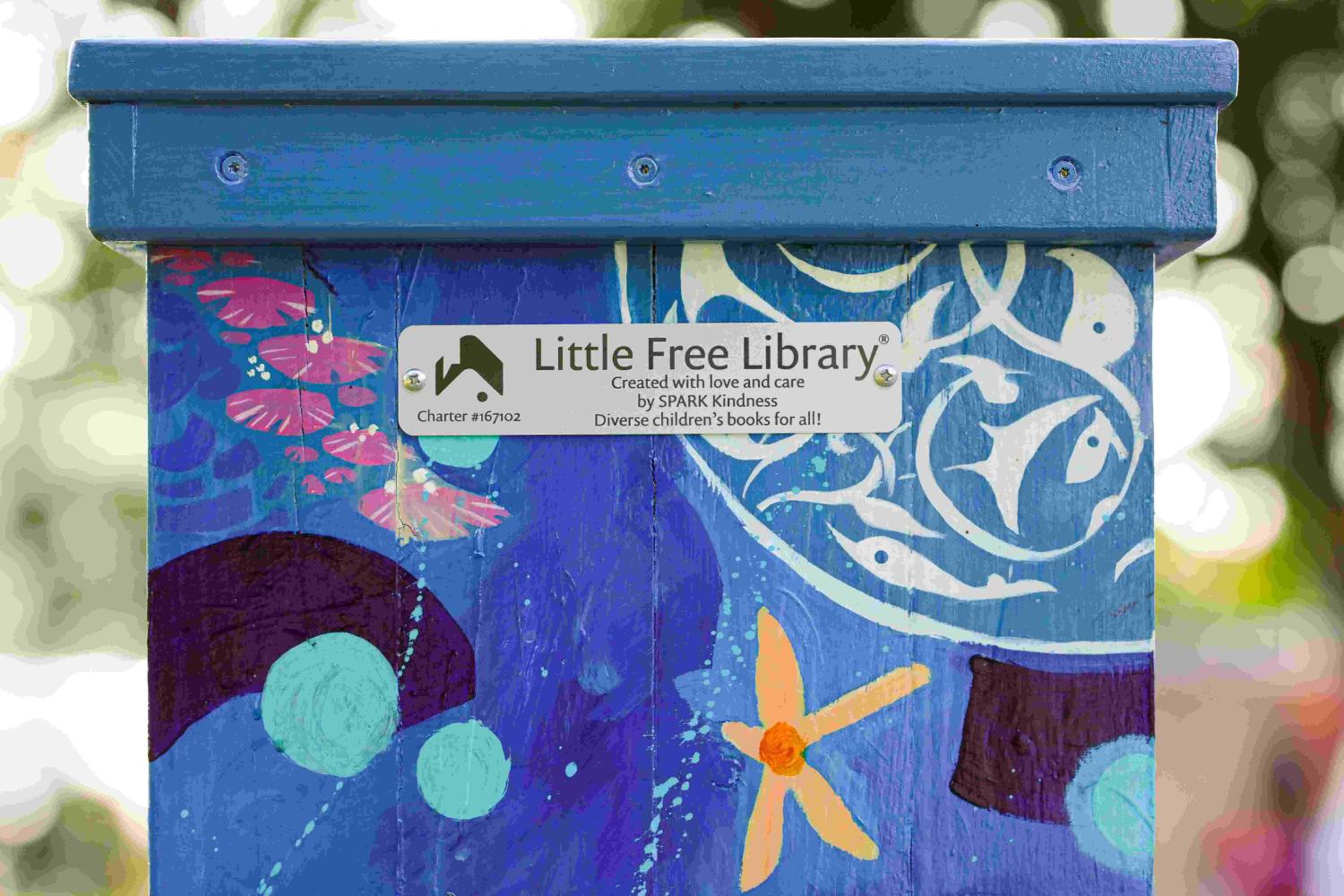 A close up of the Little Free Diverse Library located in Natick, MA